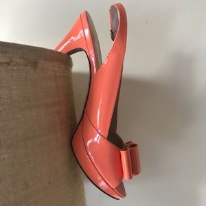 Patent leather peep toe pump